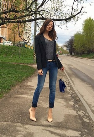 Leggy young woman in high heels